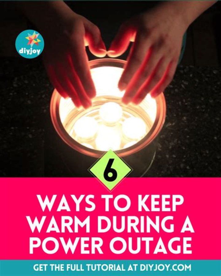 How can I keep my pet warm during a power outage